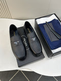 Prada Black Triangular Plaque Loafers