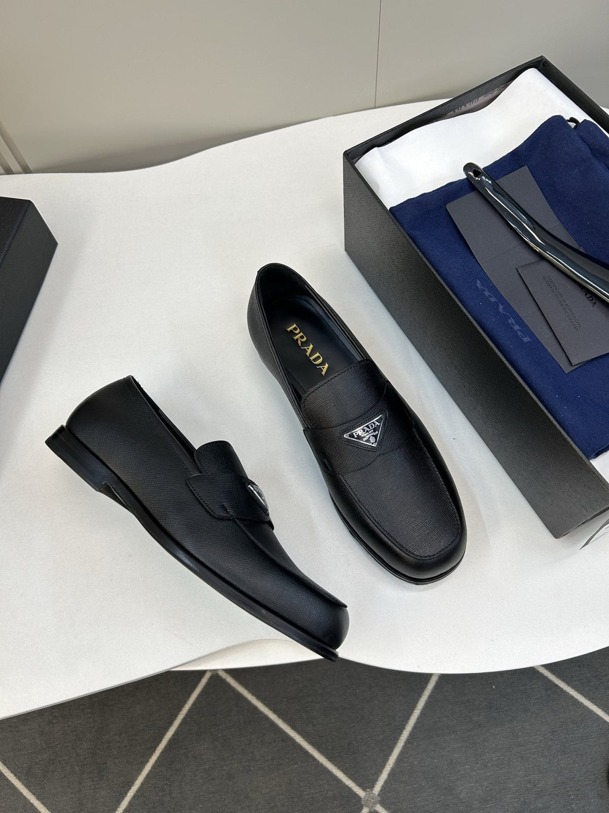 Prada Black Triangular Plaque Loafers