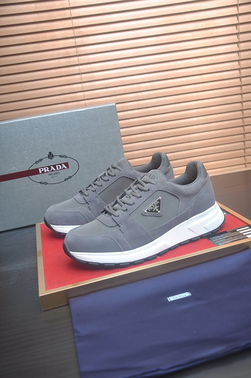 Prada Triangle Plaque Low-Top Sneakers - Lace-Up Closure