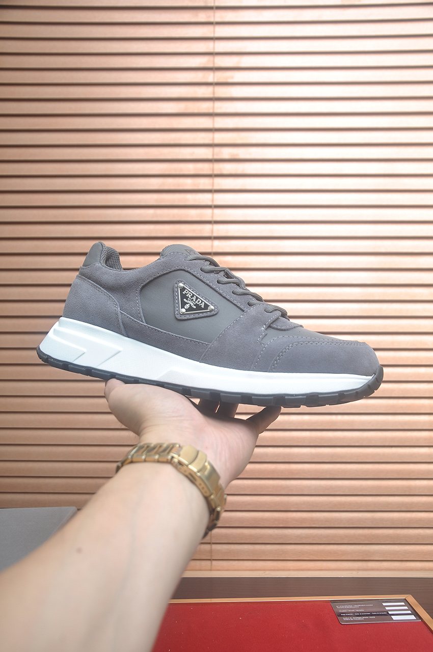 Prada Triangle Plaque Low-Top Sneakers - Lace-Up Closure